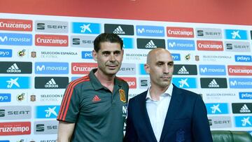 The new coach of the Spanish national football team, Fernando Hierro (L) poses with president of the Spanish football federation Luis Rubiales, as they attend a press conference at Krasnodar Academy on June 13, 2018, ahead of the Russia 2018 World Cup foo