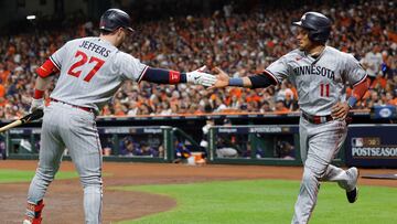 HOUSTON, TEXAS - OCTOBER 08: Jorge Polanco #11 of the Minnesota Twins celebrates with Ryan Jeffers #27 after scoring a run against the Houston Astros on a double hit by Carlos Correa #4 during the first inning in Game Two of the Division Series at Minute Maid Park on October 08, 2023 in Houston, Texas.   Carmen Mandato/Getty Images/AFP (Photo by Carmen Mandato / GETTY IMAGES NORTH AMERICA / Getty Images via AFP)