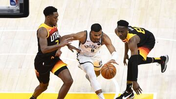 SALT LAKE CITY, UTAH - MARCH 24: Timothe Luwawu-Cabarrot #9 of the Brooklyn Nets drives between Trent Forrest #3 and Miye Oni #81 of the Utah Jazz during a game at Vivint Smart Home Arena on March 24, 2021 in Salt Lake City, Utah. NOTE TO USER: User expressly acknowledges and agrees that, by downloading and/or using this photograph, user is consenting to the terms and conditions of the Getty Images License Agreement. Alex Goodlett/Getty Images/AFP
== FOR NEWSPAPERS, INTERNET, TELCOS & TELEVISION USE ONLY ==