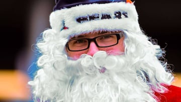 CHICAGO, IL - DECEMBER 24: A fan dresses as Santa prior to the game between the Chicago Bears and the Washington Redskins at Soldier Field on December 24, 2016 in Chicago, Illinois. David Banks/Getty Images/AFP
== FOR NEWSPAPERS, INTERNET, TELCOS & TELEVISION USE ONLY ==