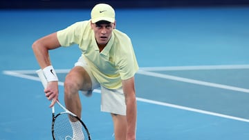 Italy's Jannik Sinner looks on after a return against USA's Ben Shelton during their men's singles semi-final match on day thirteen of the Australian Open tennis tournament in Melbourne on January 24, 2025. (Photo by Martin KEEP / AFP) / -- IMAGE RESTRICTED TO EDITORIAL USE - STRICTLY NO COMMERCIAL USE --