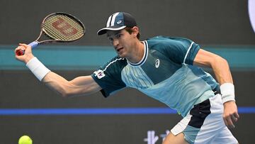 Chile�s Nicolas Jarry hits a return to Germany�s Alexander Zverev during their China Open tennis tournament men's singles quarterfinal match in Beijing on October 2, 2023. (Photo by Jade Gao / AFP)