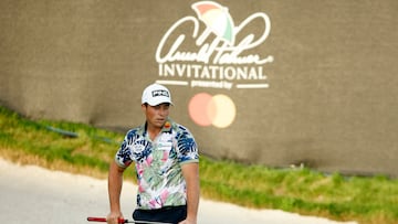 Scottie Scheffler made a late charge and surged up the leaderboard into a share of the lead with a second-round 5-under par 67.