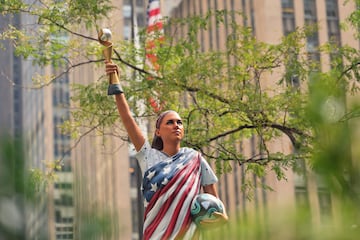 A statue of USWNT player Alex Morgan stands in Fox Square in New York City.
