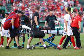 Yasser Larouci is stretchered off after being injured in the friendly against Sevilla.