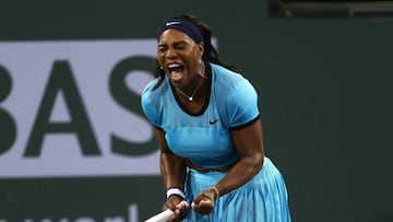 Serena Williams celebrates a point against Simona Halep.