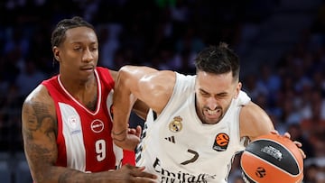 MADRID, 02/10/2025.- El escolta estadounidense de Olympiacos Saben Lee (i) defiende al base argentino Facundo Campazzo, del Real Madrid, durante el partido de EuroLiga que Real Madrid y Olympiacos disputan este jueves en el Movistar Arena, en Madrid. EFE/Sergio Pérez