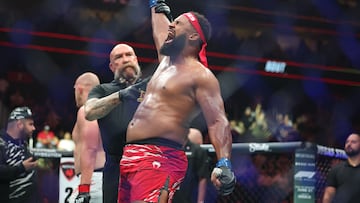 Jun 7, 2025; Newark, New Jersey, UNITED STATES; Waldo Cortes Acosta (blue gloves) reacts after defeating Serghei Spivac (red gloves) during UFC 316 at Prudential Center. Mandatory Credit: Vincent Carchietta-Imagn Images