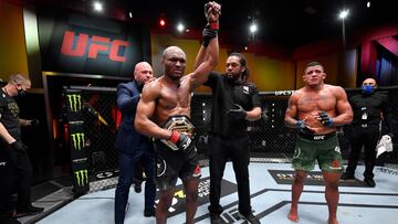 Usman beats Burns with TKO and makes history