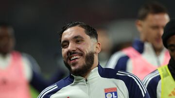 Lyon's French midfielder #18 Ryan Cherki smiles during the warm up ahead of the French L1 football match between Paris Saint-Germain and Olympique Lyonnais at the Parc des Princes stadium in Paris, on December 15, 2024. (Photo by FRANCK FIFE / AFP)