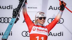 Winner Switzerland's Lara Gut-Behrami celebrates during the podium ceremony of Women's downhill event at the FIS Alpine Ski World Cup in Crans-Montana, on February 16, 2024. (Photo by Fabrice COFFRINI / AFP)