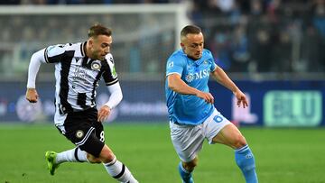 Soccer Football - Serie A - Udinese v Napoli - Bluenergy Stadium, Udine, Italy - December 14, 2024 Napoli's Stanislav Lobotka in action with Udinese's Sandi Lovric REUTERS/Jennifer Lorenzini