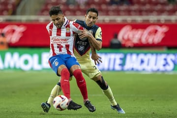 (L-R), Alexis Vega of Guadalajara and Luis Fuentes of America during the game Guadalajara vs America, corresponding to Eleventh round match and Edition 240 of the National Classic of the Torneo Guard1anes Clausura 2021 of the Liga BBVA MX, at the Akron Stadium, on March 14, 2021.
<br><br>
(I-D), Alexis Vega de Guadalajara y Luis Fuentes de America durante el partido Guadalajara vs America, correspondiente a la Jornada 11 y Edicion 240 del Clasico Nacional del Torneo Clausura Guard1anes 2021 de la Liga BBVA MX, en el Estadio Akron, el 14 de Marzo de 2021.
