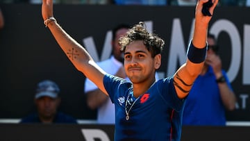 Chile's Alejandro Tabilo celebrates after winning his match against Serbia's Novak Djokovic at the Men's ATP Rome Open tennis tournament at Foro Italico in Rome on May 12, 2024. (Photo by Tiziana FABI / AFP)