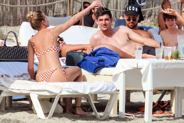 The Real Madrid and Belgium goalkeeper is recharging his batteries on the beaches of the Spanish island Ibiza.