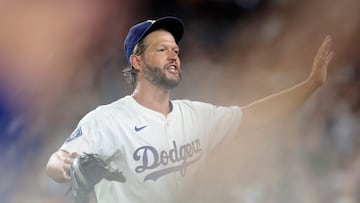 LOS ANGELES, CALIFORNIA - JULY 02: Clayton Kershaw #22 of the Los Angeles Dodgers reacts after striking out Vinny Capra #41 of the Chicago White Sox during the sixth inning to record his 3,000th career strikeout at Dodger Stadium on July 02, 2025 in Los Angeles, California. Ronald Martinez/Getty Images/AFP (Photo by RONALD MARTINEZ / GETTY IMAGES NORTH AMERICA / Getty Images via AFP)