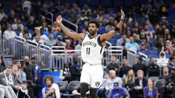 ORLANDO, FLORIDA - MARCH 15: Kyrie Irving #11 of the Brooklyn Nets celebrates after scoring against the Orlando Magic in the first half at Amway Center on March 15, 2022 in Orlando, Florida. NOTE TO USER: User expressly acknowledges and agrees that, by downloading and or using this photograph, User is consenting to the terms and conditions of the Getty Images License Agreement.   Mark Brown/Getty Images/AFP
 == FOR NEWSPAPERS, INTERNET, TELCOS &amp; TELEVISION USE ONLY ==