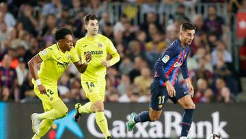 BARCELONA, SPAIN - OCTOBER 20: Ferran Torres of FC Barcelona Johan Andres Mojica of Villarreal Manuel Trigueros of Villarreal  during the La Liga Santander  match between FC Barcelona v Villarreal at the Spotify Camp Nou on October 20, 2022 in Barcelona Spain (Photo by David S. Bustamante/Soccrates/Getty Images)