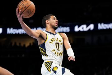 Nov 21, 2023; Atlanta, Georgia, USA; Indiana Pacers guard Tyrese Haliburton (0) goes to the basket against the Atlanta Hawks during the second half at State Farm Arena. Mandatory Credit: Dale Zanine-USA TODAY Sports