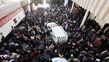 People gather as members of the Syrian civil defence group, known as the White Helmets, search for prisoners underground at Sednaya prison, after rebels seized the capital and announced that they have ousted President Bashar al-Assad in Sednaya, Syria, December 9, 2024. REUTERS/Amr Abdallah Dalsh