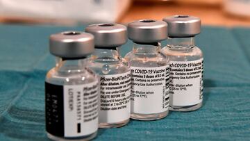 A photo shows vials containing the Pfizer-BioNTech vaccine in Toulouse, southern France, on January 20, 2021 during a Covid-19 (coronavirus) vaccination campaign for people over 75 and vulnerable persons. (Photo by GEORGES GOBET / AFP)