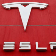 Why did Tesla lower the price on its Model X and S standard range electric cars?