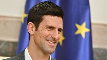 (FILES) In this file photo taken on February 03, 2022 Serbian tennis player Novak Djokovic looks on as he attends a meeting with Serbian President in Belgrade. - Top-ranked 20-time Grand Slam champion Novak Djokovic, prevented from playing the Australian