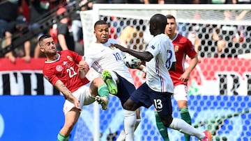 BUDAPEST, HUNGARY - JUNE 19: Kylian Mbappe of France battles for possession with Endre Botka of Hungary during the UEFA Euro 2020 Championship Group F match between Hungary and France at Puskas Arena on June 19, 2021 in Budapest, Hungary. (Photo by Tibor