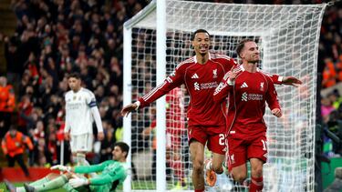 Soccer Football - UEFA Champions League - Liverpool v Real Madrid - Anfield, Liverpool, Britain - November 4, 2025 Liverpool's Alexis Mac Allister celebrates scoring their first goal with Hugo Ekitike Action Images via Reuters/Jason Cairnduff TPX IMAGES OF THE DAY