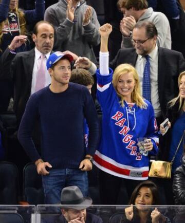 Tom Ackerley y Margot Robbie.