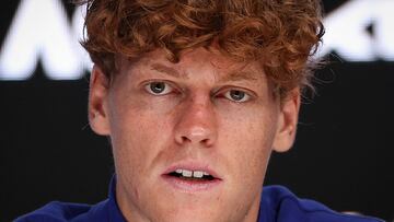 (FILES) Italy's Jannik Sinner speaks during a press conference after his victory against Germany's Alexander Zverev during their men's singles final match on day fifteen of the Australian Open tennis tournament in Melbourne on January 27, 2025. Jannik Sinner has accepted a three-month ban from tennis after the world number one admitted team mistakes led to him twice testing positive for traces of banned substance clostebol in March last year. (Photo by Adrian Dennis / AFP) / -- IMAGE RESTRICTED TO EDITORIAL USE - STRICTLY NO COMMERCIAL USE --