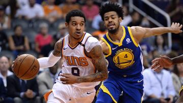 Apr 8, 2018; Phoenix, AZ, USA; Phoenix Suns guard Tyler Ulis (8) dribbles the ball past Golden State Warriors guard Quinn Cook (4) during the first half at Talking Stick Resort Arena. Mandatory Credit: Orlando Ramirez-USA TODAY Sports