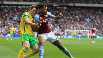 Norwich City's US striker Josh Sargent (L) vies with Aston Villa's English defender Tyrone Mings (R) during the English Premier League football match between Aston Villa and Norwich City at Villa Park in Birmingham, central England on April 30, 2022. (Photo by Lindsey Parnaby / AFP) / RESTRICTED TO EDITORIAL USE. No use with unauthorized audio, video, data, fixture lists, club/league logos or 'live' services. Online in-match use limited to 120 images. An additional 40 images may be used in extra time. No video emulation. Social media in-match use limited to 120 images. An additional 40 images may be used in extra time. No use in betting publications, games or single club/league/player publications. /