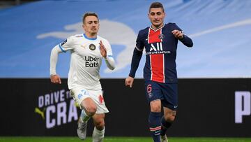 Marseille&#039;s French defender Valentin Rongier (L) challenges Paris Saint-Germain&#039;s Italian midfielder Marco Verratti during the French L1 football match between Olympique de Marseille and Paris Saint-Germain at the Velodrome Stadium in Marseille,