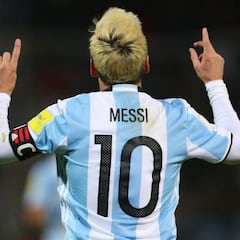 Messi helps Argentina overcome Uruguay and top qualifying group