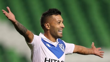 CALI, COLOMBIA - DECEMBER 01: Lucas Janson of Velez celebrates after scoring the first goal of his team during a round of sixteen second leg match between Deportivo Cali and Velez as part of Copa CONMEBOL Sudamericana 2020 at Deportivo Cali Stadium on December 01, 2020 in Cali, Colombia. (Photo by Fernando Vergara - Pool/Getty Images)