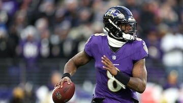 BALTIMORE, MARYLAND - JANUARY 20: Quarterback Lamar Jackson #8 of the Baltimore Ravens looks to pass against the Houston Texans during the AFC Divisional Playoff game at M&T Bank Stadium on January 20, 2024 in Baltimore, Maryland.   Rob Carr/Getty Images/AFP (Photo by Rob Carr / GETTY IMAGES NORTH AMERICA / Getty Images via AFP)