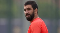 Arda Turan: Out-of-shape Barça player pictured enjoying hols