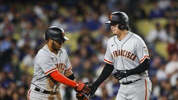 LOS ANGELES, CALIFORNIA - JUNE 16: Wilmer Flores #41 of the San Francisco Giants celebrates with Thairo Estrada #39 after hitting a two-run home run in the seventh inning against the Los Angeles Dodgers at Dodger Stadium on June 16, 2023 in Los Angeles, California.   Meg Oliphant/Getty Images/AFP (Photo by Meg Oliphant / GETTY IMAGES NORTH AMERICA / Getty Images via AFP)