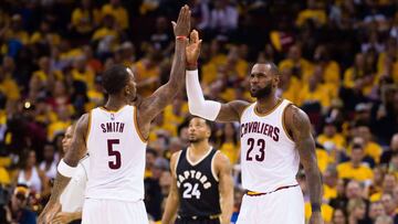 CLEVELAND, OH - MAY 3: JR Smith #5 of the Cleveland Cavaliers celebrates with LeBron James #23 during the second half of Game Two of the NBA Eastern Conference semifinals against the Toronto Raptors at Quicken Loans Arena on May 3, 2017 in Cleveland, Ohio. The Cavaliers defeated the Raptors 125-103. NOTE TO USER: User expressly acknowledges and agrees that, by downloading and or using this photograph, User is consenting to the terms and conditions of the Getty Images License Agreement. Jason Miller/Getty Images/AFP
== FOR NEWSPAPERS, INTERNET, TELCOS & TELEVISION USE ONLY ==