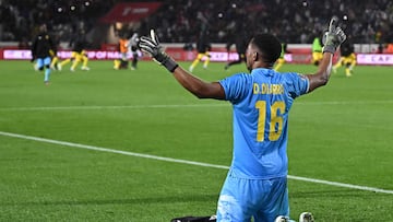 Mali's goalkeeper #16 Djigui Diarra celebrates after winning the penalty shoot-out of the Africa Cup of Nations (CAN) round of 16 football match between Mali and Tunisia at Mohammed V Stadium in Casablanca on January 3, 2026. (Photo by Paul ELLIS / AFP)