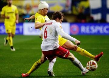 Denis Cheryshev con Christian Schwegler.