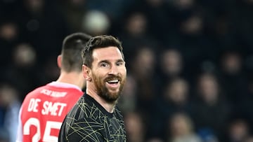 Paris Saint-Germain's Argentine forward Lionel Messi reacts after missing a goal opportunity during the French L1 football match between Paris Saint-Germain (PSG) and Stade de Reims at the Parc des Princes stadium in Paris on January 29, 2023. (Photo by Anne-Christine POUJOULAT / AFP)