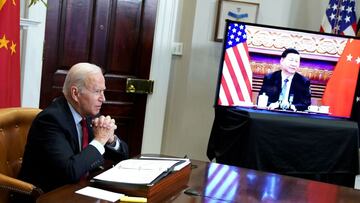 US President Joe Biden meets with China&#039;s President Xi Jinping during a virtual summit from the Roosevelt Room of the White House in Washington, DC.
