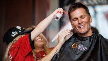 TAMPA, FL - June 08, 2022 - Quarterback Tom Brady #12 of the Tampa Bay Buccaneers has his hair colored during the 8th annual Cut/Color for a Cure at AdventHealth Training Center. Photo By Kyle Zedaker/Tampa Bay Buccaneers