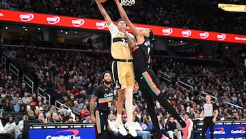 WASHINGTON, DC - DECEMBER 21: Will Riley #27 of the Washington Wizards drives to the basket in the first quarter against Victor Wembanyama #1 of the San Antonio Spurs at Capital One Arena on December 21, 2025 in Washington, DC. NOTE TO USER: User expressly acknowledges and agrees that, by downloading and or using this photograph, User is consenting to the terms and conditions of the Getty Images License Agreement. Greg Fiume/Getty Images/AFP (Photo by Greg Fiume / GETTY IMAGES NORTH AMERICA / Getty Images via AFP)