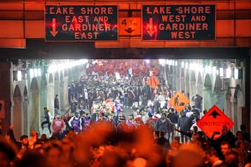 Toronto Raptors fans celebrate their win in the NBA championships in downtown Toronto, Ontario on early June 14, 2019.