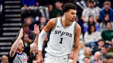 Nov 26, 2024; Salt Lake City, Utah, USA; San Antonio Spurs forward/center Victor Wembanyama (1) reacts after a three point shot call by referee Scott Twardoski (52) against the Utah Jazz during the first half at the Delta Center. Mandatory Credit: Christopher Creveling-Imagn Images