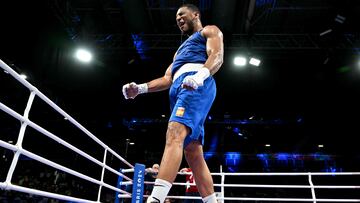 Spain's Enmanuel Reyes Pla celebrates after winning against Belgium's Victor Schelstraete in the men's 92kg quarter-final boxing match during the Paris 2024 Olympic Games at the North Paris Arena, in Villepinte on August 1, 2024. (Photo by MOHD RASFAN / AFP)