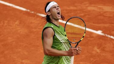 PARIS - JUNE 05: Rafael Nadal of Spain celebrates a point during his 3-1 sets victory over Rafael Nadal of Spain during the Mens Final match on the fourteenth day of the French Open at Roland Garros on June 5, 2005 in Paris, France. (Photo by Michael Stee